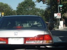 Person's Legs Hanging Out of Car Person's Legs Hanging Out of Car